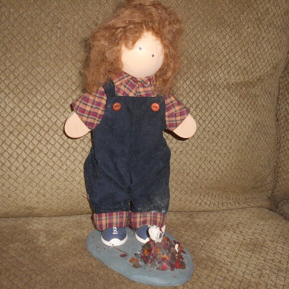 Wooden Doll with Pet Standing on Rock - Picture 1 of 3